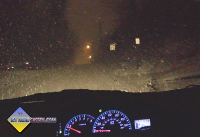 Winter tires on snowy hill