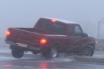 Truck wrecks on icy bridge